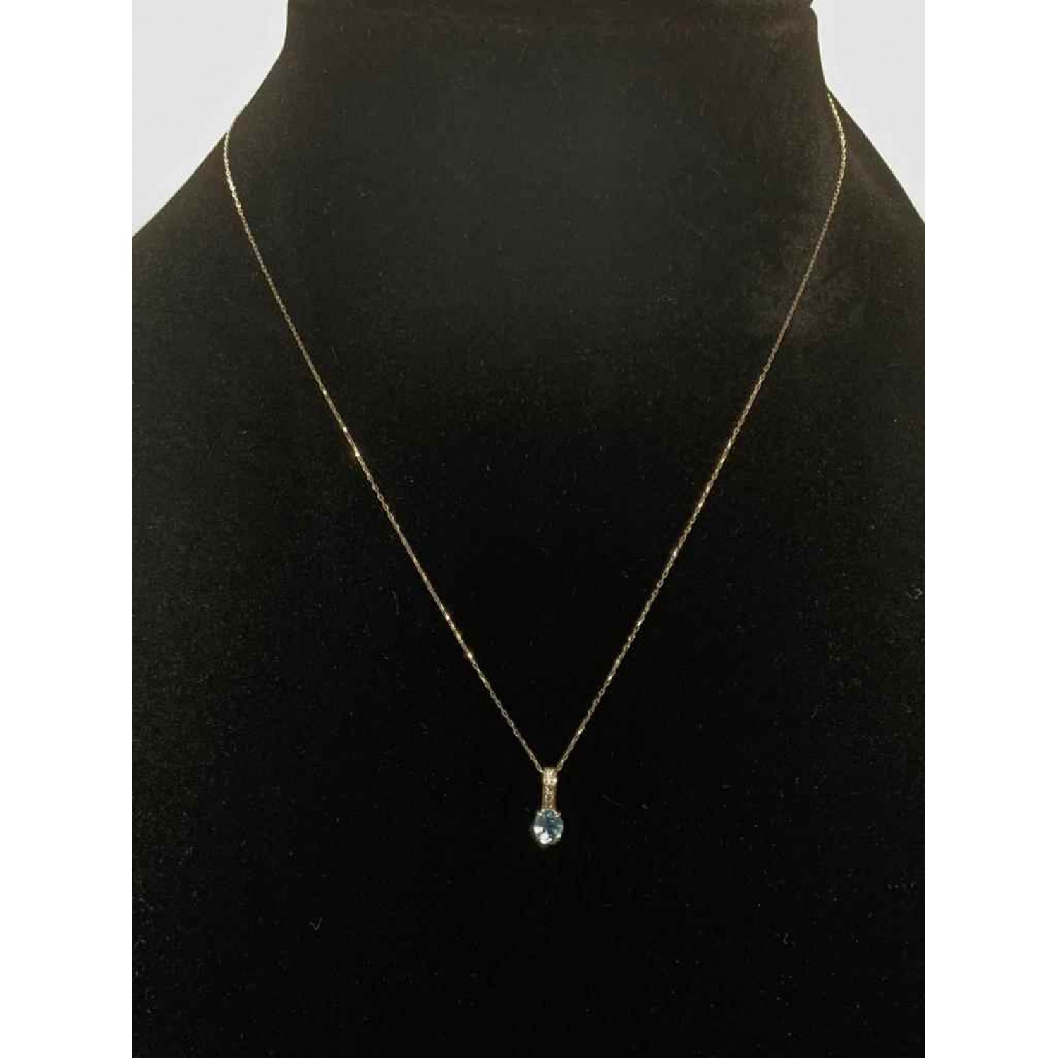 Blue Topaz & Diamond Pendant Set In 14k Gold
